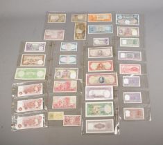 A good collection of international bank notes to include Bank of England, Israel, India, Pakistan,