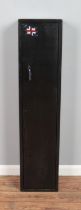 A black painted steel gun safe cabinet with double lock and wall fixing holes to reverse. Includes
