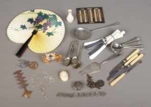 A quantity of collectables to include silver pill box, Belgian coin bracelet, EPNS cutlery, three