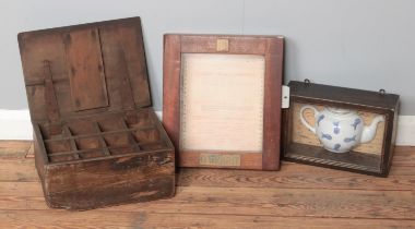 A box framed tea pot along with secondary box frame with permit to work addressed to D Wright signed