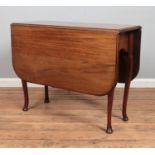 A late Nineteenth/early Twentieth century mahogany gateleg drop leaf table. Height: 72cm, Width: