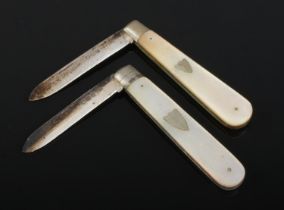 Two silver bladed fruit knives, both having mother of pearl scales. By Sheffield makers Harrison