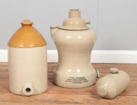 Three pieces of stoneware, to include flagon and 'Microid Gas Generator' by Grippin & George.