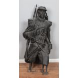A large life size fibreglass statue of a military soldier, possible ex museum piece.