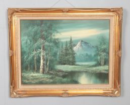 Morris gilt framed oil on canvas depicting riverside landscape. Approx. size including frame 77cm