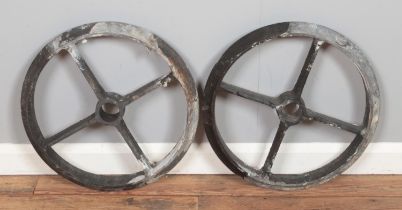 A pair of cast iron wheels Dx49cm