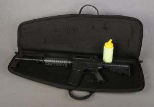 An Armalite M15A4 Carbine Air Soft Gun with carry case. CANNOT POST.