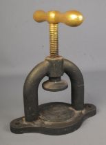 A Victorian cast iron heavy duty golf ball press.