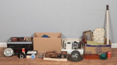 Four boxes of assorted items, to include Lucas car lights, Hornsea cups and saucers, assorted