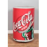 A retro Coca-Cola can-shaped fridge.