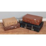 A collection of vintage travel suitcases to include Dreadnought and Revelation examples.