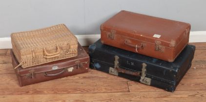 A collection of vintage travel suitcases to include Dreadnought and Revelation examples.