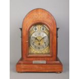 A Junghans inlaid mahogany bracket clock. Having brass dial and subsidiary dials for speed and