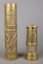 A Hockley Lamp and Limelight Company miners lamp together with a detailed trench art shell case