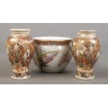 A pair of small Japanese Satsuma baluster vases along with a similar bowl decorated with