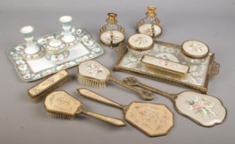 A quantity of dressing table items. Includes Noritake and embroided examples.