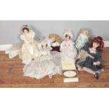 A box of assorted porcelain collectors dolls to include The Doll House Company Ascot Belle and boxed