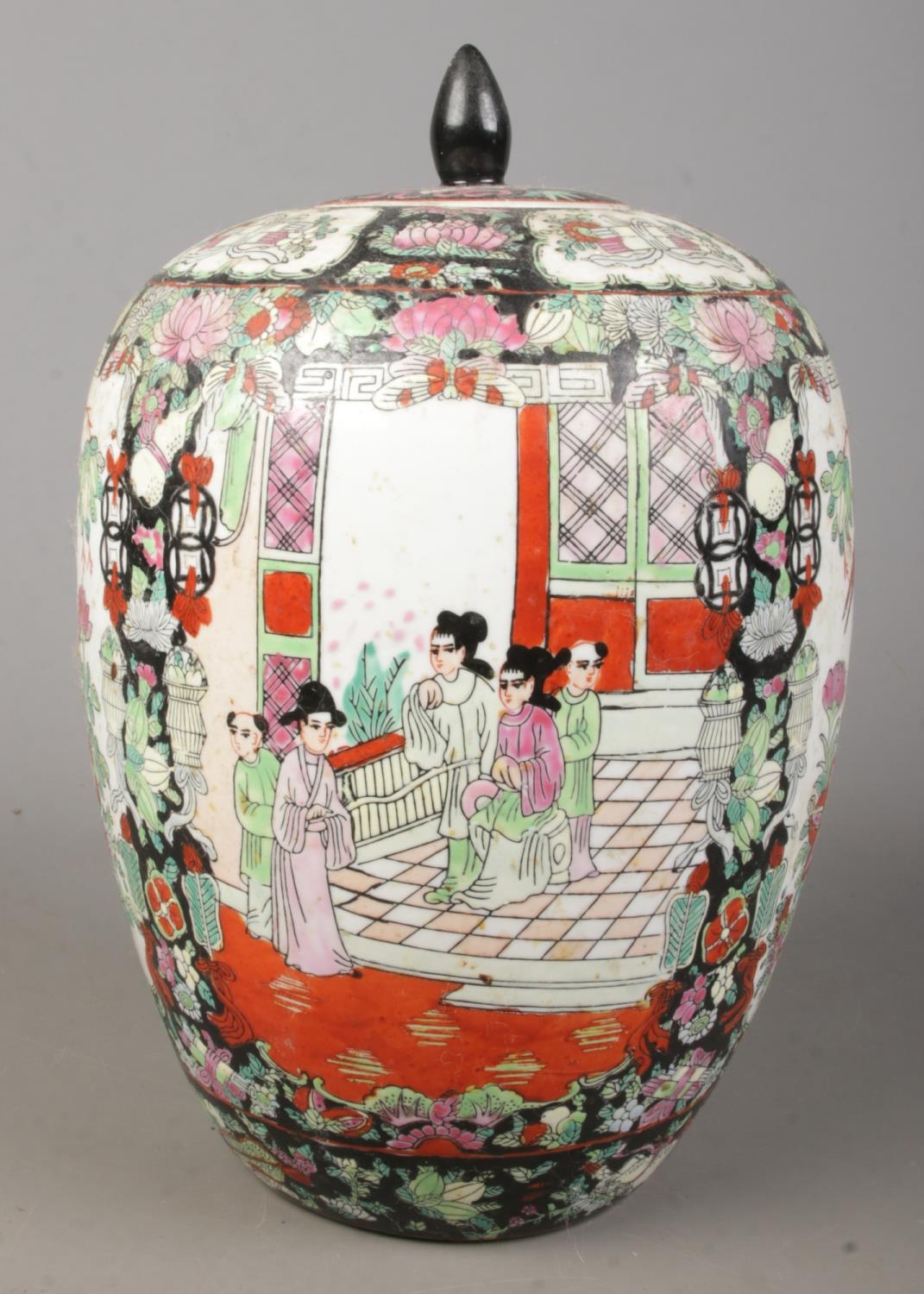 An Oriental lidded vase. Having hand painted decoration depicting figures, birds and flowers. Height - Image 2 of 3