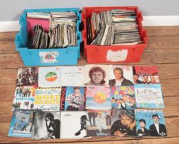 Two boxes of assorted singles records, to include Soft Cell, Dionne Warwick, Rod Stewart, Yazoo,