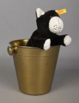 A Steiff Original 'Koko' cat, 281402, in gold effect ice bucket.