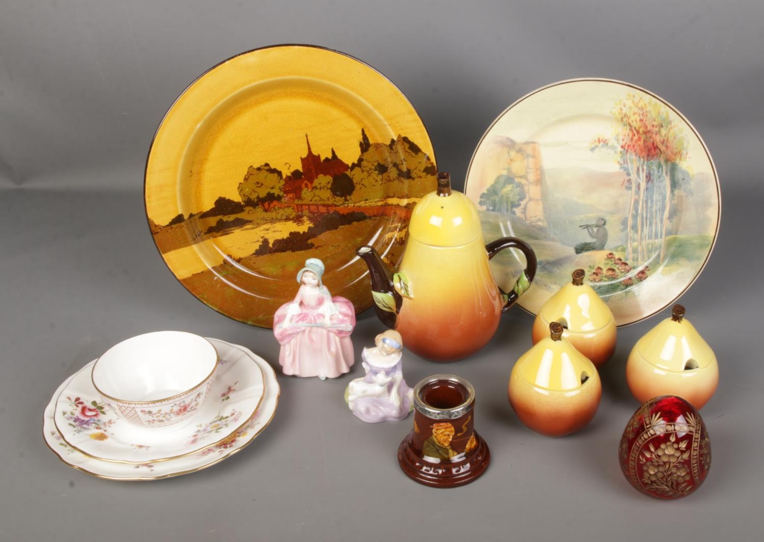 A collection of ceramics to include Royal Doulton figures, Carlton Ware pear part tea service, Royal