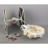 Two large Hasbro Stars Wars models to include Millennium Falcon and Tie Fighter along with three LTL