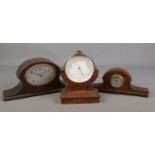 A W Heath & Co barometer together with to oak cased mantel clocks.