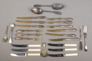 A box of assorted cutlery. Includes Solingen silver handled examples, stamped 800.