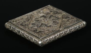 A white metal filigree cigarette case, with diamond and floral design. Length: 9cm, Width: 7.5cm.