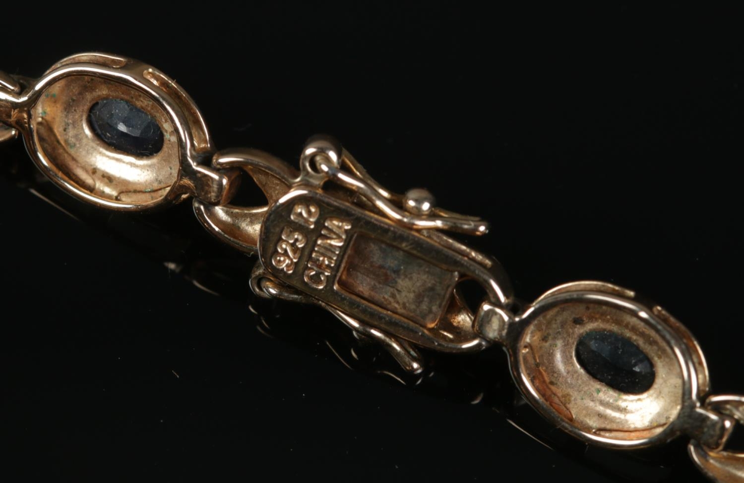 A silver gilt bracelet set with sapphire and diamond stones, along with a silver pendant on chain. - Image 2 of 2