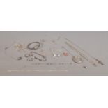 A quantity of mainly silver jewellery to include locket, bangle, rings bow brooch and necklace