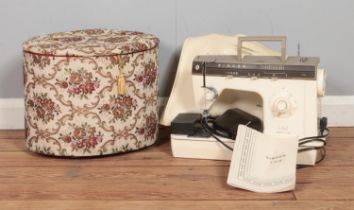 A Singer 7108 sewing machine, together with a sewing box and contents.