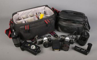 Two Olympus OM10 cameras along with a good selection of accessories to include Starblitz 3000BTS,