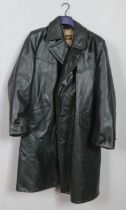 A full length black leather jacket. Label for Muwe, Munchen. Size 48.