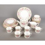 A collection of Royal Worcester tea wares in the Royal Garden pattern to include tea pot, milk