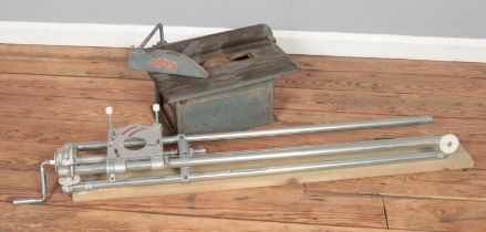 A vintage Myblo table saw along with a router sled for fluting.