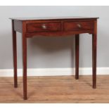 A Georgian Mahogany side table having two short drawers with brass ring pull handles. Hx75cm