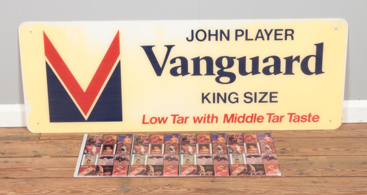 A large vintage John Player Vanguard King Size Perspex advertising sign along with smaller metal