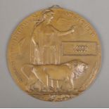 A World War One bronze memorial plaque/death penny awarded to B Abdul Rasool. Soldered hook to