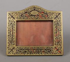 A Victorian mahogany and tortoiseshell Boulle photo frame, with front motto for Gang Warily 'Go