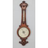 A Victorian carved oak barometer. Hx108cm