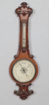 A Victorian carved oak barometer. Hx108cm