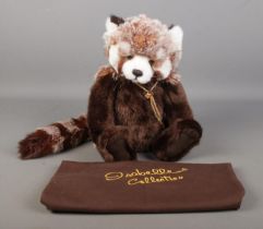 A Charlie Bears jointed teddy bear in the form of a red panda named Roxie from the Isabelle
