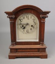 Wooden cased Victorian mantel clock and key with movement marked CB of Badische Uhrenfabrik