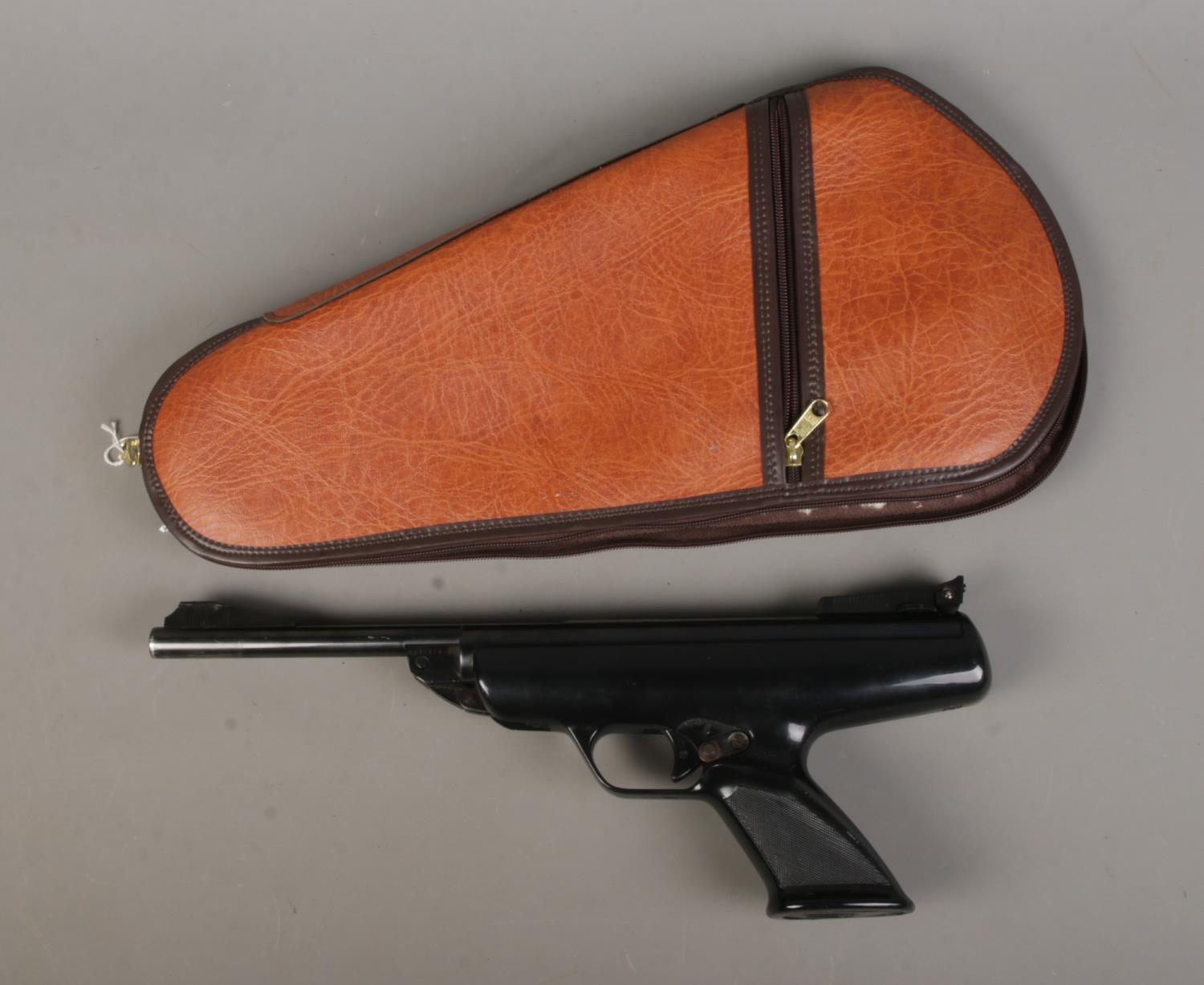 A BSA Scorpion .22 calibre air pistol with leather carry case. Serial Number RB51675. CANNOT POST.