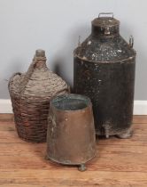 A large milk churn together with wicker clad demijohn and copper log/coal bucket