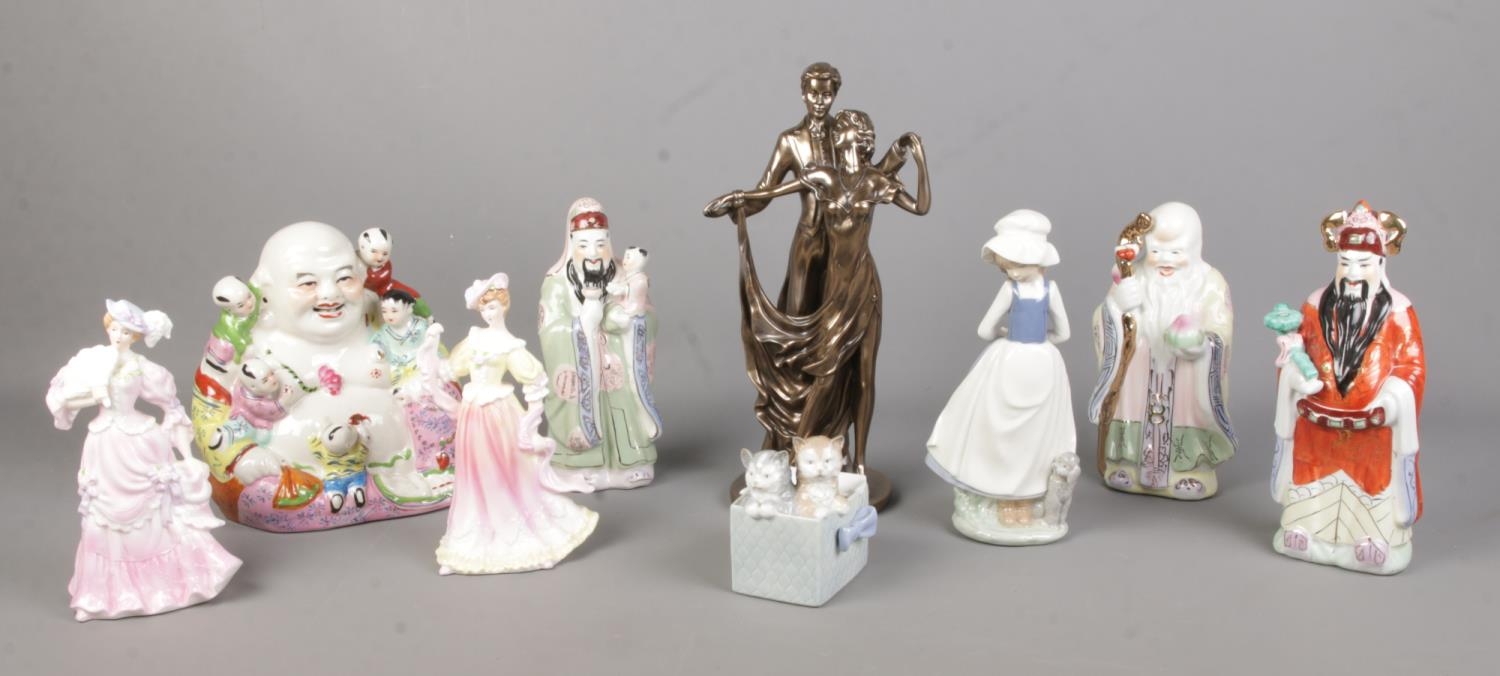 A collection of ceramic and resin figures, including examples by Crosa, Leonardo Collection and Nao.