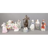 A collection of ceramic and resin figures, including examples by Crosa, Leonardo Collection and Nao.
