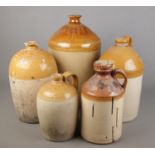 Five large stoneware flagons. Includes tallest marked for Bentley & Son, Doncaster (49cm), J&G