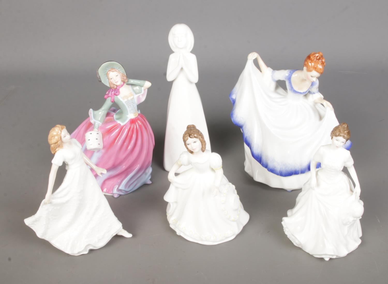 A collection of six Royal Doulton figures to include Autumn Breeze (HN4716), Harmony (HN4096),